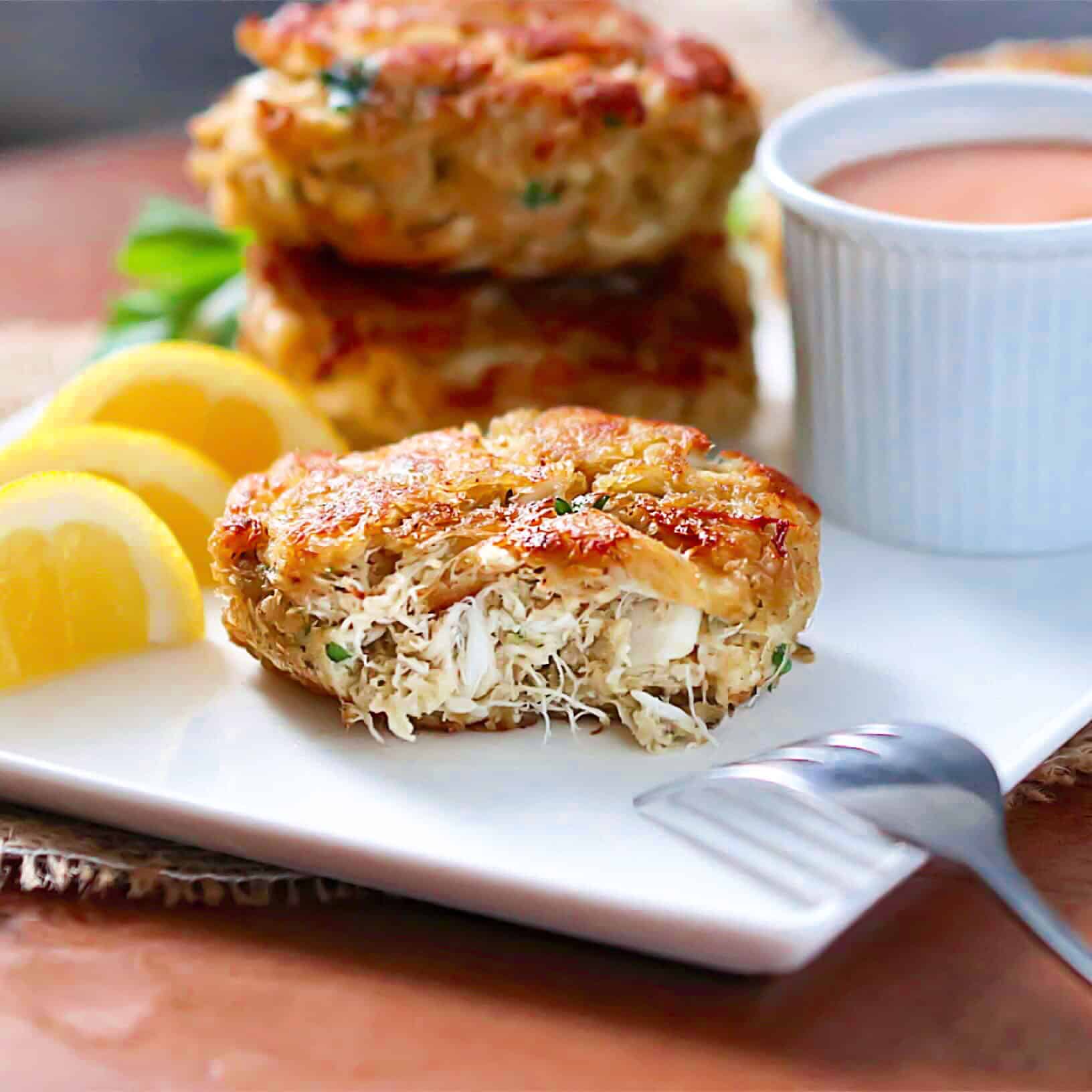 Crab Cakes with lemon wedges